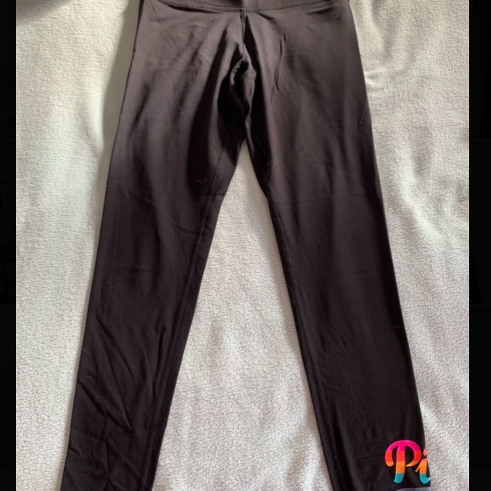 Victoria’s Secret pink leggings with rainbow logo